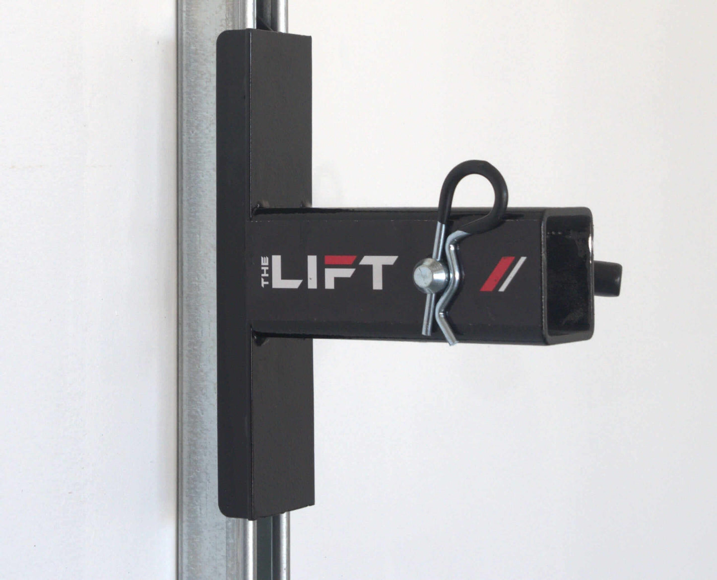 Close-up of The Lift motorized overhead storage system for easy garage organization.