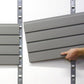 Hand installing storeWALL heavy duty slatwall panels in a garage organization system.