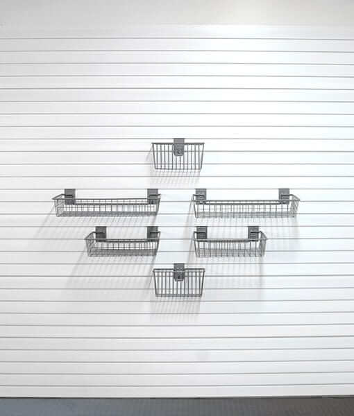 storeWALL Basic Basket Bundle displayed on slatwall, featuring caddy and shallow baskets for organized storage. 