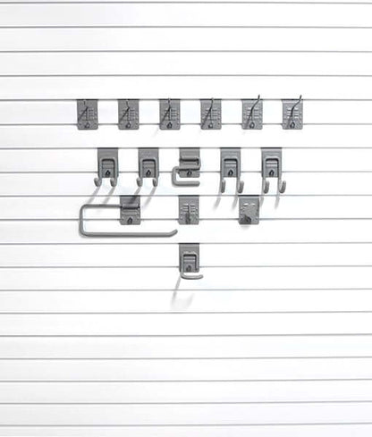StoreWALL Basic Hook Bundle displaying various storage hooks on a slat wall for organizing tools and equipment.