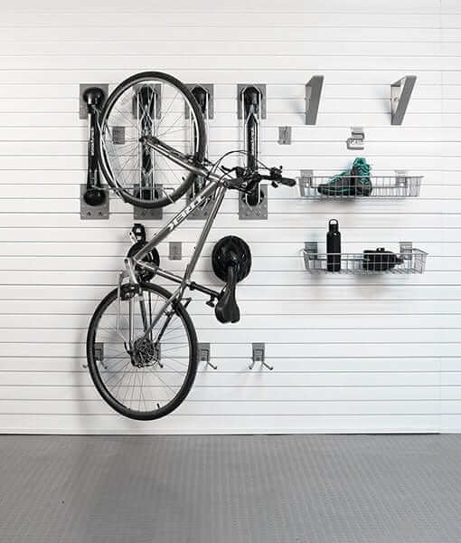 storeWALL Deluxe Bike Bundle showcasing organized bike storage with hooks and baskets on a slatwall.