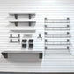 storeWALL Deluxe Shelf Bundle showcasing various garage storage solutions on a slat wall.