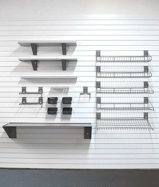 storeWALL Deluxe Shelf Bundle showcasing various garage storage solutions on a slat wall.